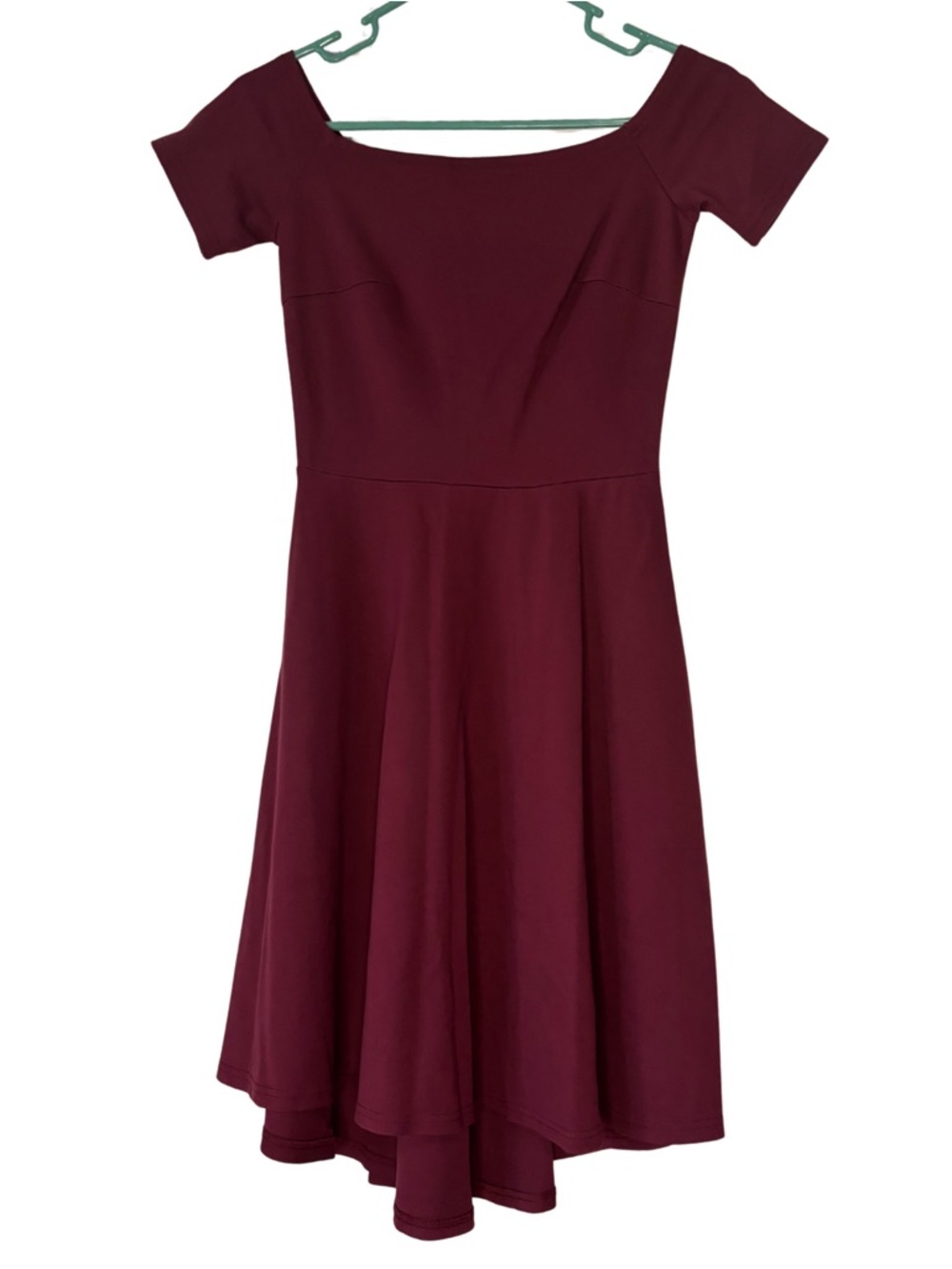 Sarin Matthew’s Off-the-Shoulder Dress in Wine